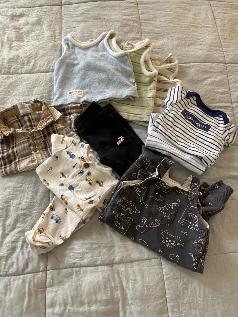 Calvin Klein Navy & White Striped Baby Onesie with Mixed Neutral Baby Clothing